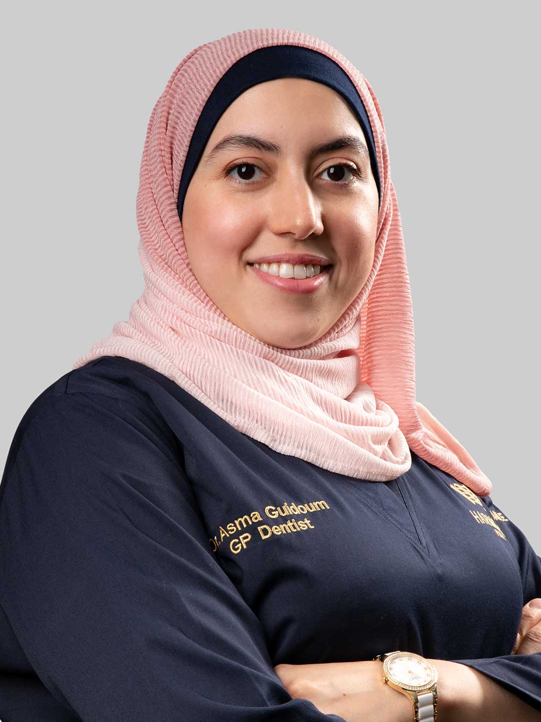 Portrait of Dr. Asma Guidoum - Specialist Endodontist at Harmony Medical Center in Abu Dhabi