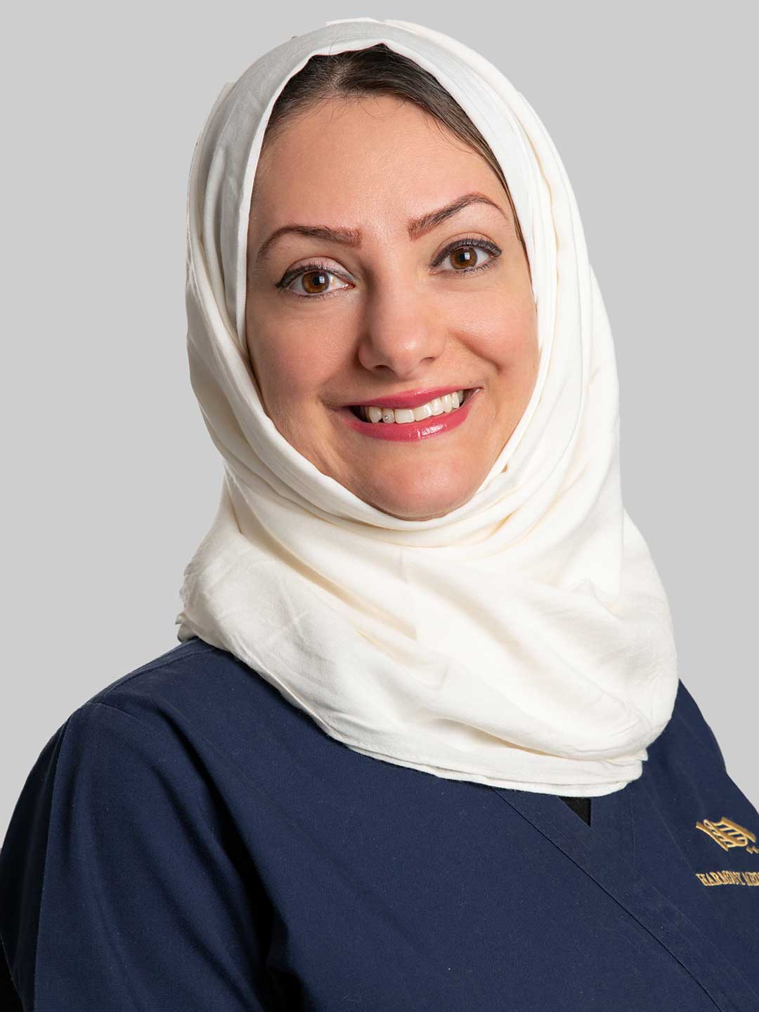 Portrait of Dr. Dana Qaddoura - General Dentist at Harmony Medical Center