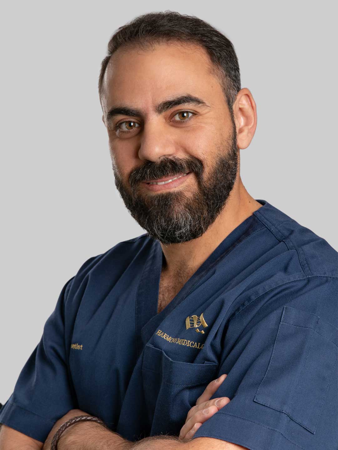 Portrait of Dr. Mohammad Baderaddeen - Specialist Orthodontist at Harmony Medical Center in MBZ City, Abu Dhabi