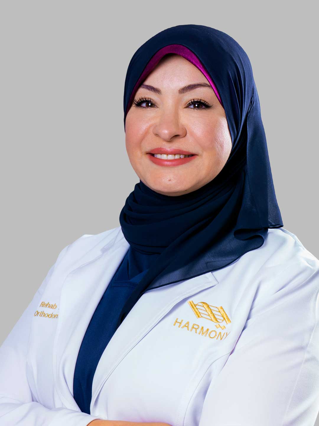 Dr. Rehab Elsayed - Specialist Orthodontist at Harmony Medical Center in MBZ City, Abu Dhabi
