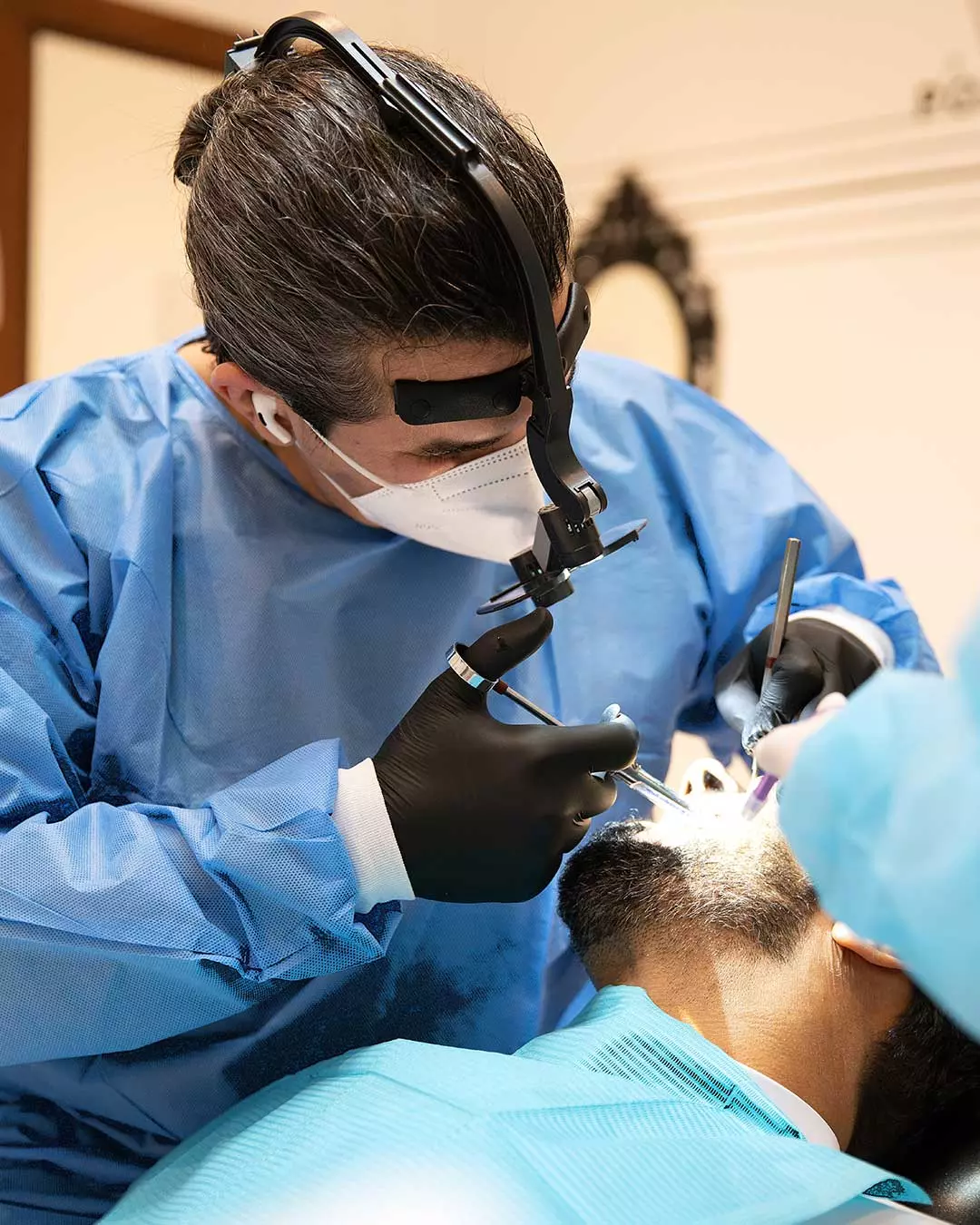 Dr. Ahmad Al Jazairi – Medical Director and Head of Oral & Maxillofacial Surgery at Harmony Medical Center performs pain-free tooth extraction.